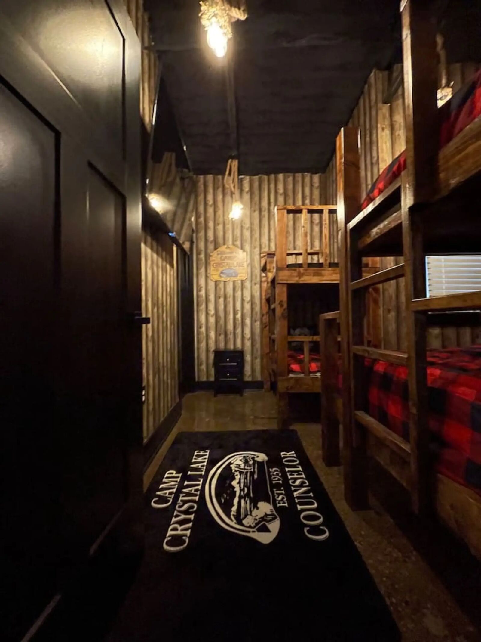 Camp Crystal Lake themed bunk room at Black House Stay Airbnb Indianapolis
