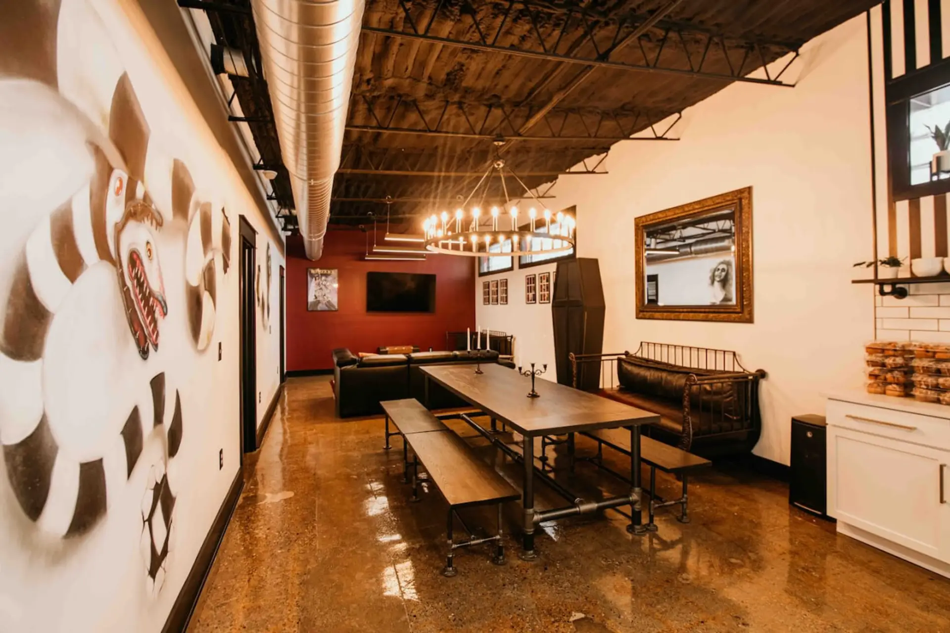 Beetlejuice-themed living room at Black House Stay Airbnb Indianapolis