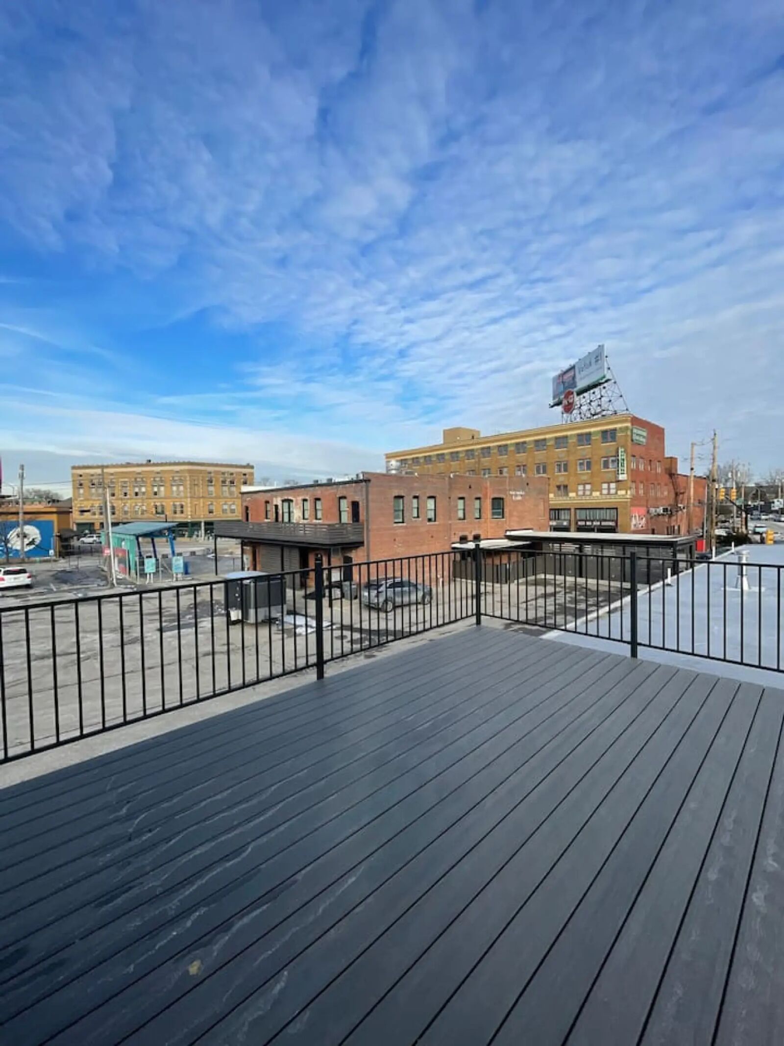 Rooftop deck with downtown Indianapolis skyline view at Black House Stay Airbnb